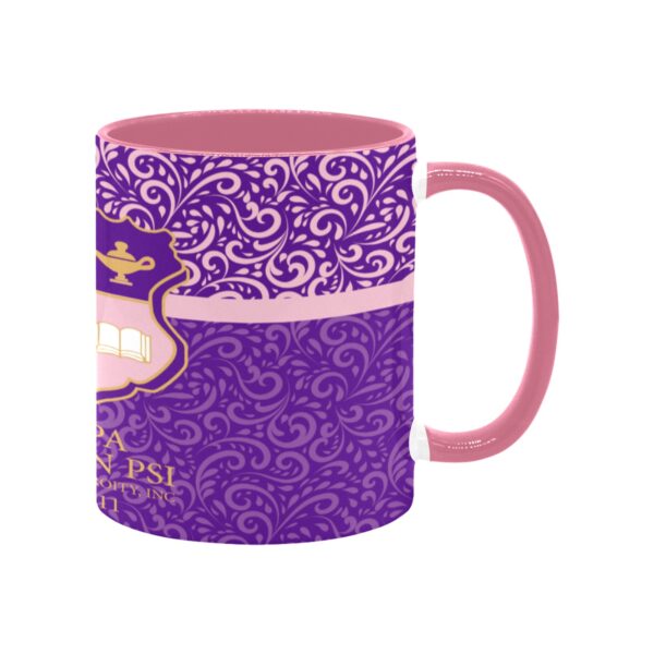 Purple patterned coffee mug with emblem.