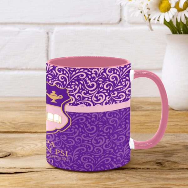 Decorative purple coffee mug on a wooden table.