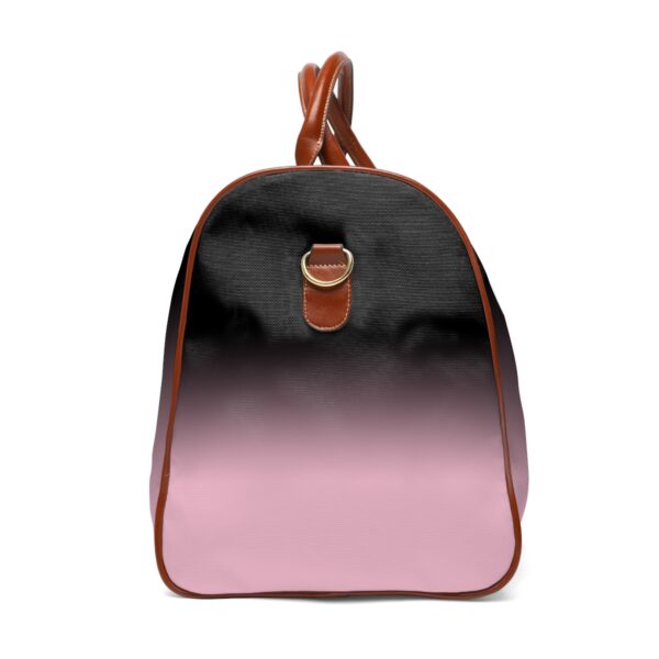 faded pink and black travel bag