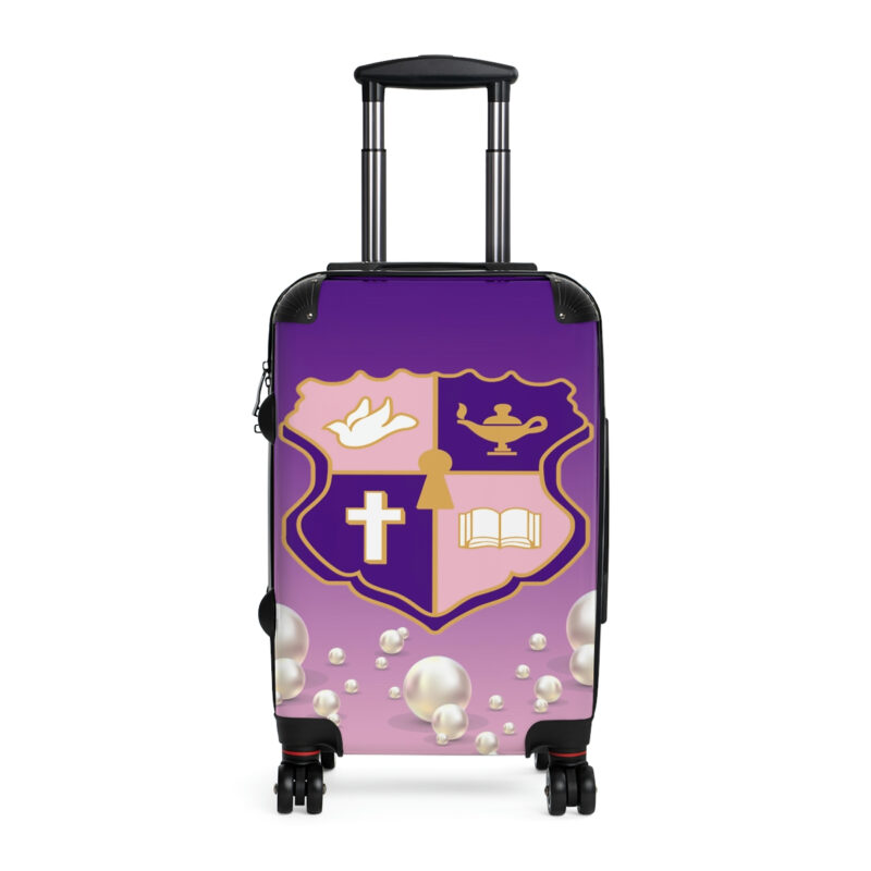 faded pink and purple k.e.Ψ. suitcases