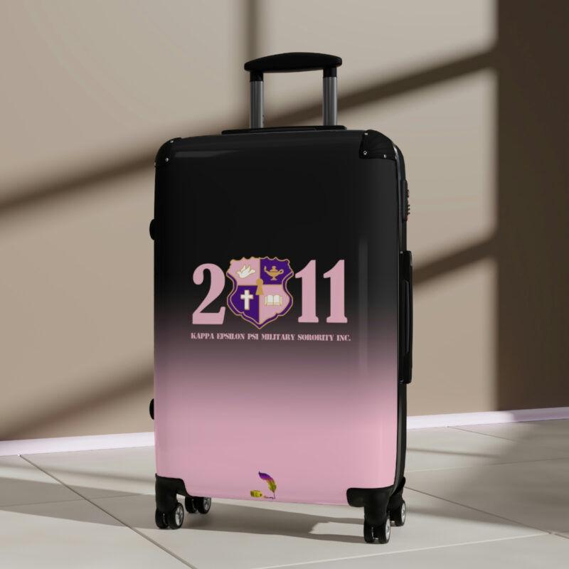 faded pink and black suitcases