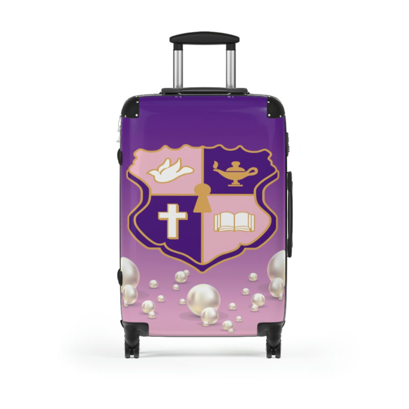 faded pink and purple k.e.Ψ. suitcases