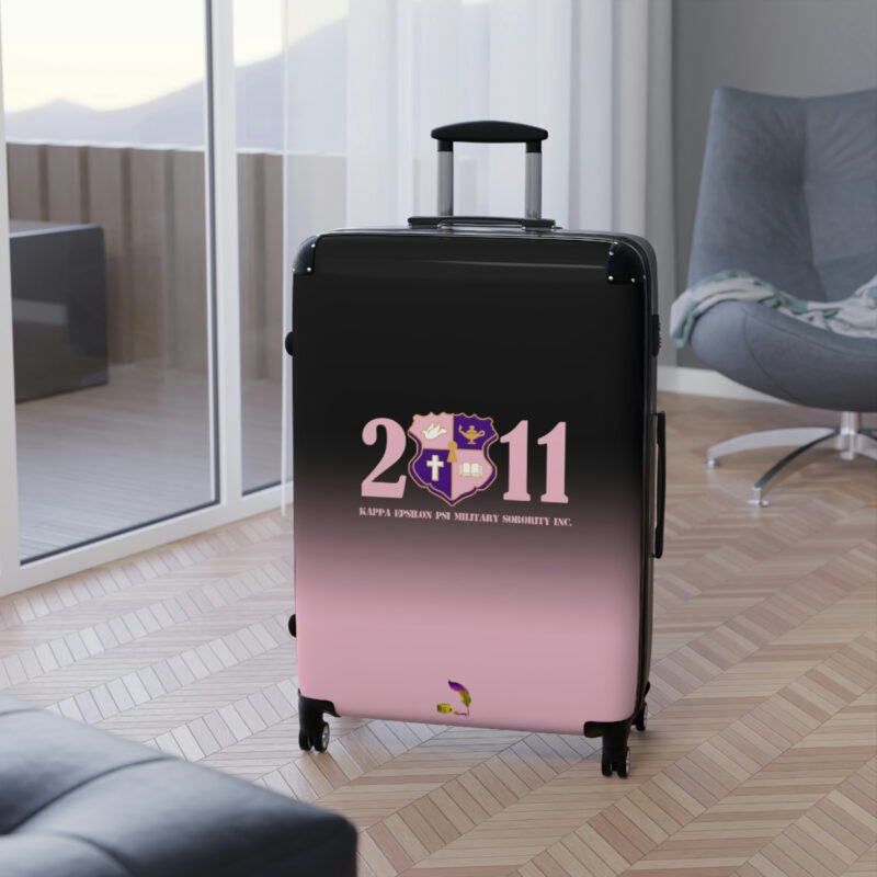 faded pink and black suitcases