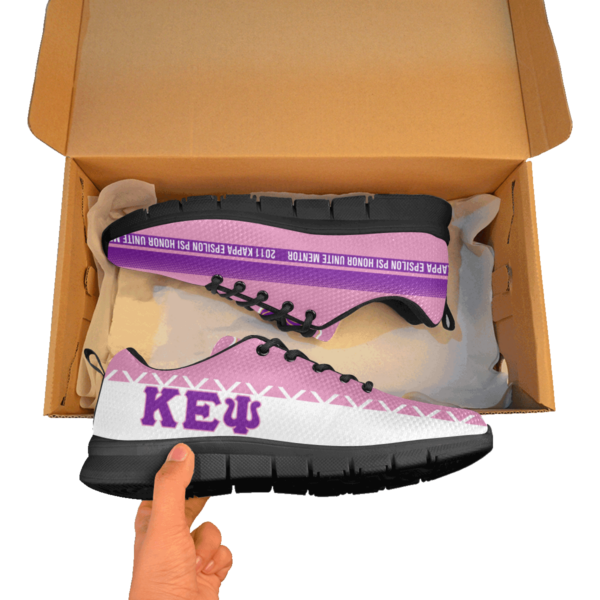 New purple sneakers being unboxed.