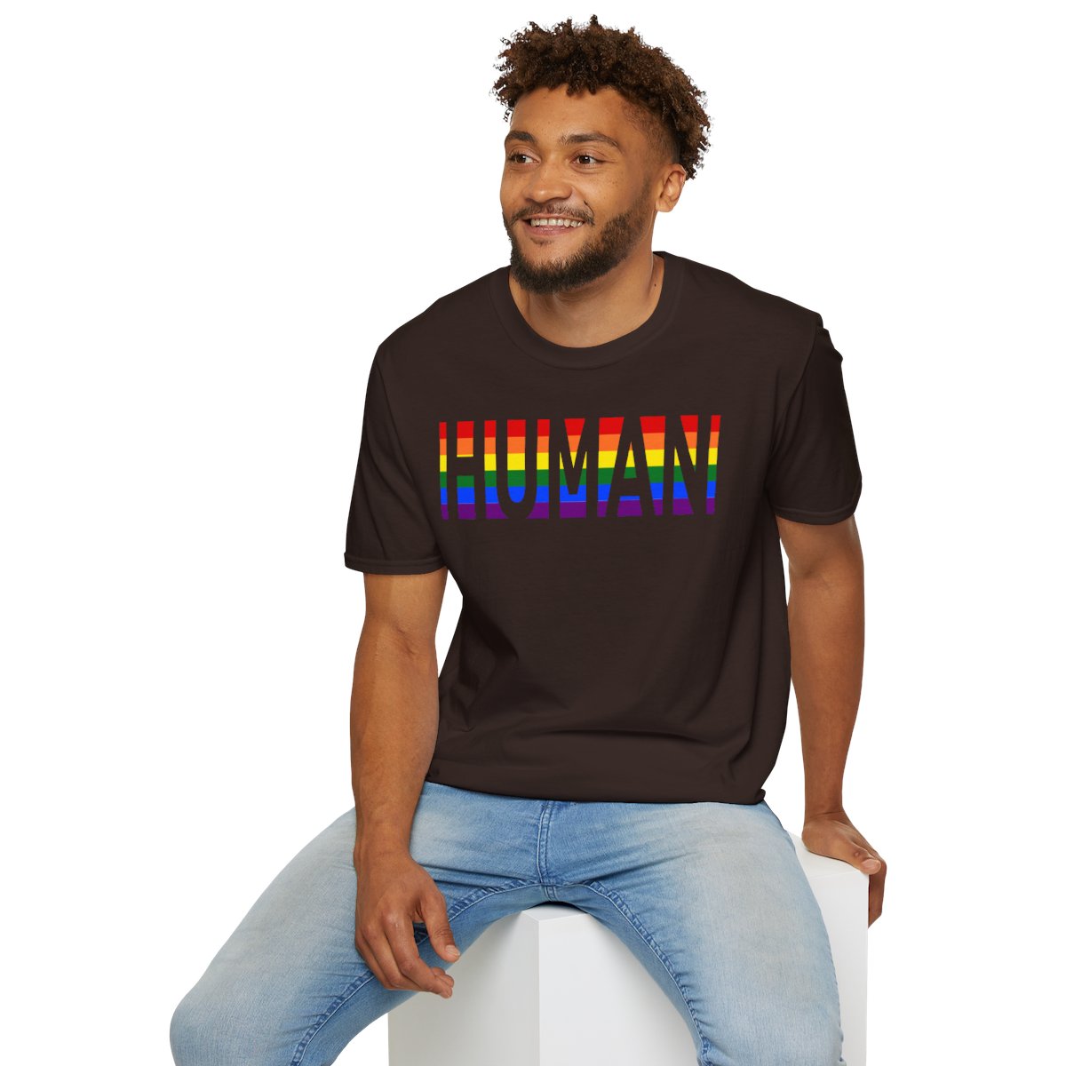 Man in black 'HUMAN' rainbow print t-shirt.