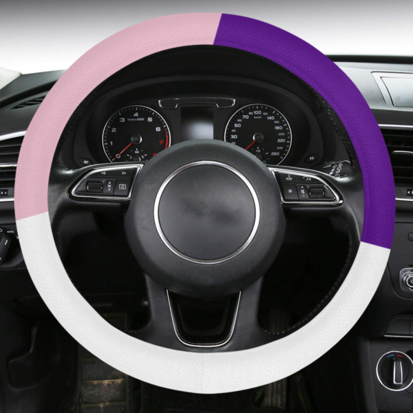 Car steering wheel and dashboard with colorful overlay.