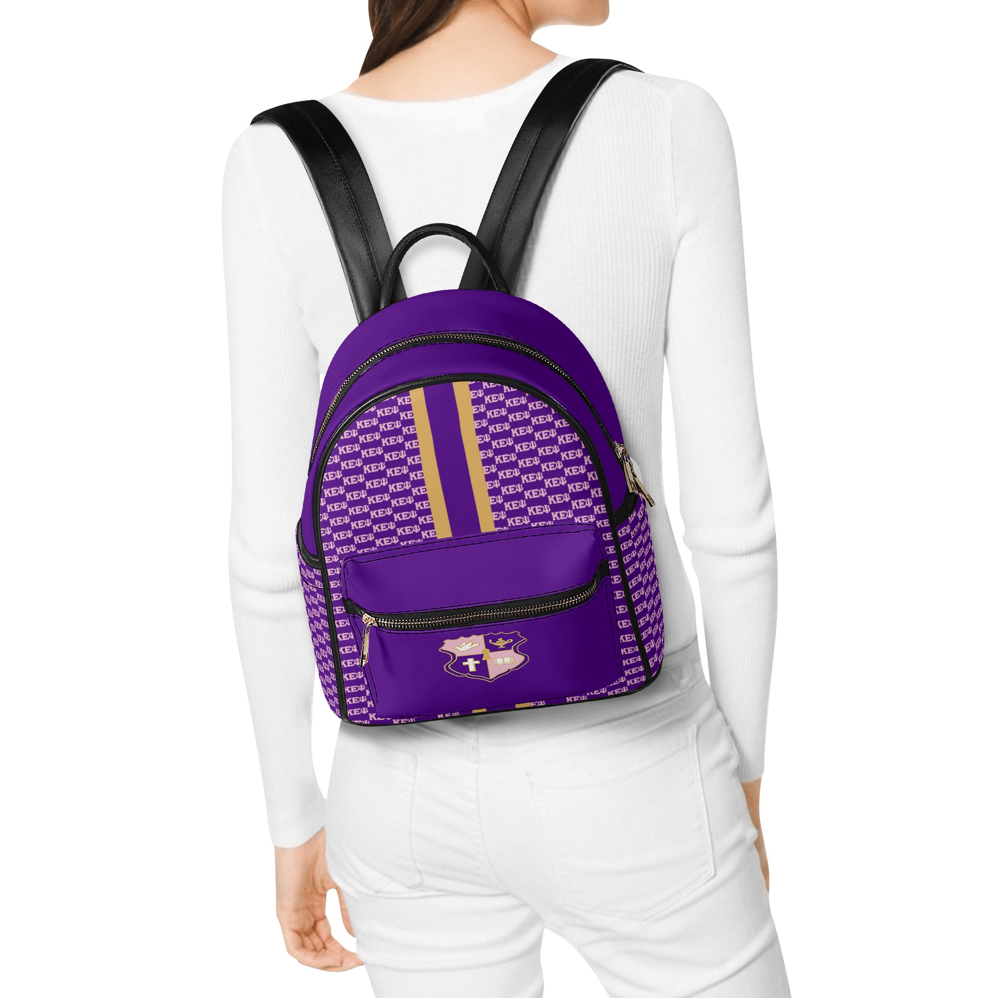 Woman wearing a purple designer backpack.