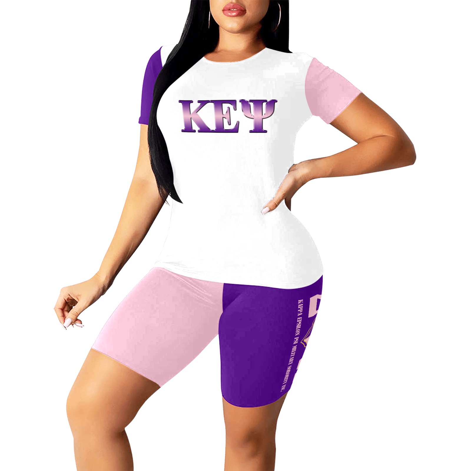 Woman in white and purple sportswear outfit.